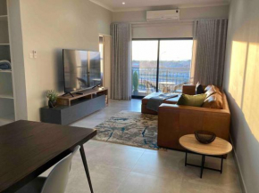 Urban Awe Apartment: Sarona City